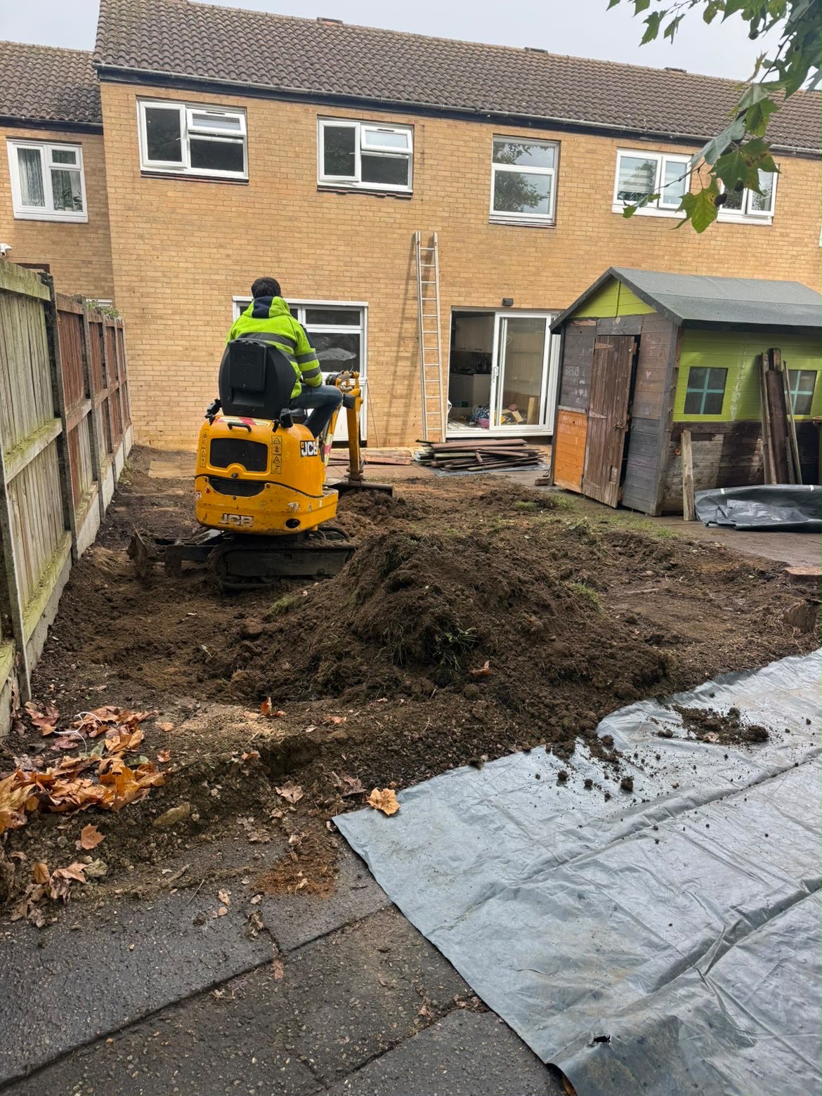 Sterling Plant Group JCB 8008 CTS micro digger excavating a customer rear garden